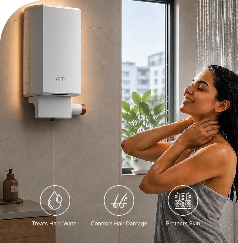 Woman washing hair with soft water from Symphony SWISH hair fall control instant geyser